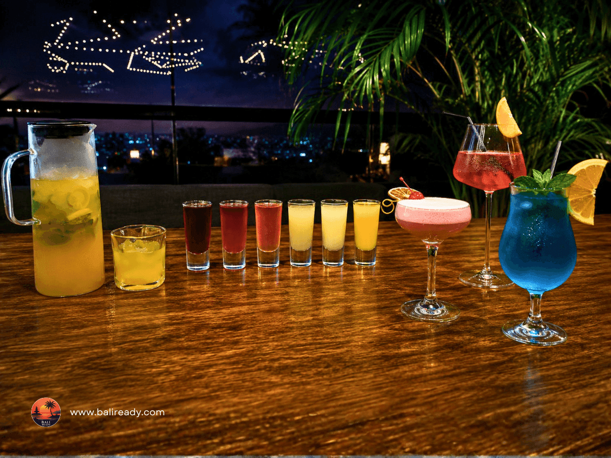 Left: Mango Passion Lemonade, Center: Rum-infused Shot Selection, Right: Signature Cocktails
